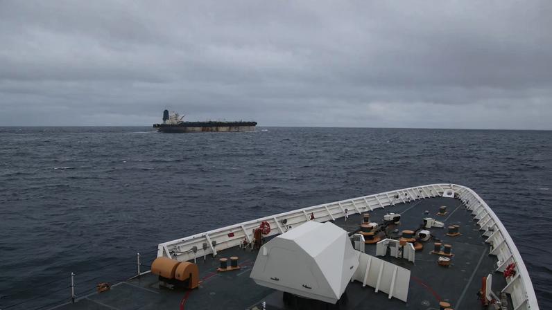 A handout image of the ship Marinera (Ex-Bella 1) seen in the distance, released on January 7, 2026. US EUROPEAN COMMAND via X/Handout via REUTERS