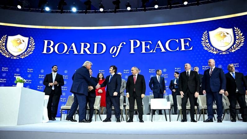 U.S. President Donald Trump shakes hands with Argentine President Javier Milei at the “Board of Peace” charter signing ceremony during the World Economic Forum in Davos, Switzerland, on Jan. 22.