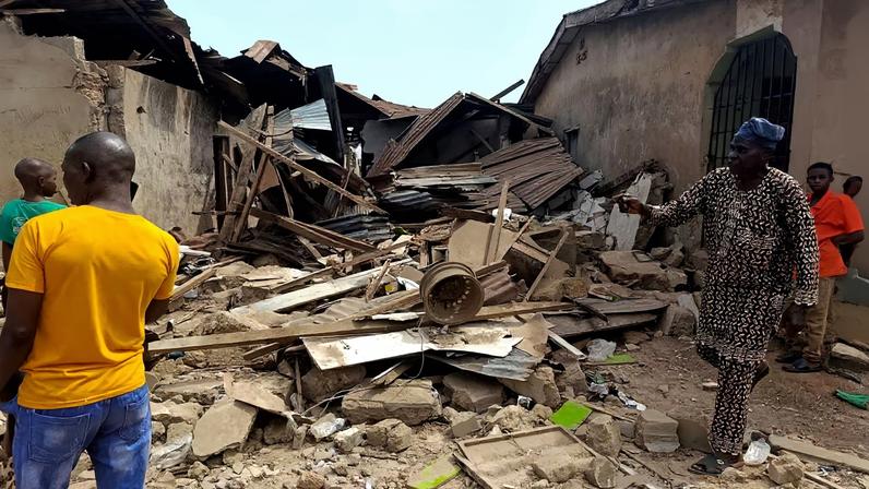 Residents inspect the damage after U.S. forces had launched a strike against Islamic State militants in Nigeria at the request of Nigeria's government, as U.S. President Donald Trump announced on Truth Social on December 25, in Offa, Kwara State, Nigeria, December 26, 2025. REUTERS/Abdullahi Dare Akogun/File Photo
