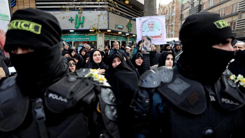 People attend the funeral of the security forces who were killed in the protests that erupted over the collapse of the currency's value in Tehran, Iran, January 14, 2026. Majid Asgaripour/WANA (West Asia News Agency) via REUTERS/File Photo