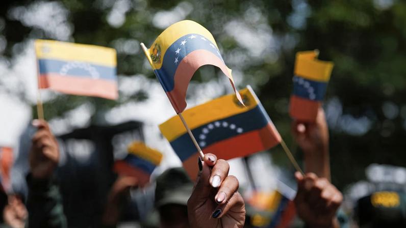 Government supporters participate in a women's march, in Caracas