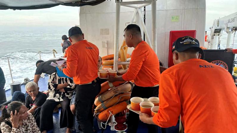 Philippine Coast Guard personnel assist survivors who were aboard the MV Trisha Kerstin 3, which capsized around the waters of Baluk-baluk Island, Basilan, Philippines, January 26, 2026. Philippine Coast Guard/Handout via REUTERS THIS IMAGE HAS BEEN SUPPLIED BY A THIRD PARTY