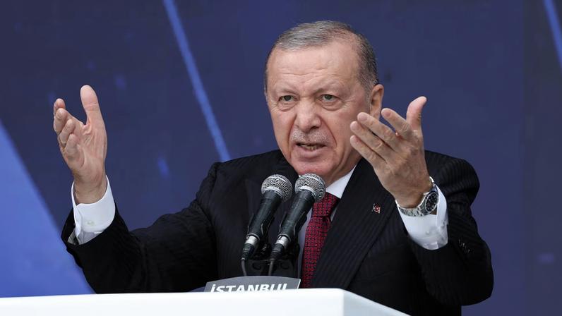 Turkish President Tayyip Erdogan speaks during a ceremony for the handover of new vehicles to the gendarmerie and police forces in Istanbul, Turkey, November 28, 2025. REUTERS/Murad Sezer