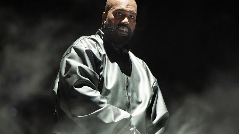 Kanye West performing in 2024.