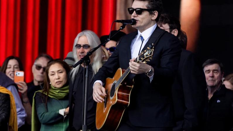 Singer John Mayer sings during a public memorial for Grateful Dead co-founder Bob Weir at Civic Center Plaza in San Francisco, Jan. 17, 2026.