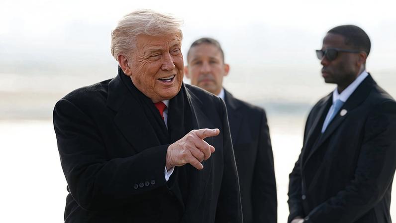 U.S. President Donald Trump disembarks Air Force One as he arrives at Zurich Airport in Zurich, Switzerland, before attending the World Economic Forum in Davos.