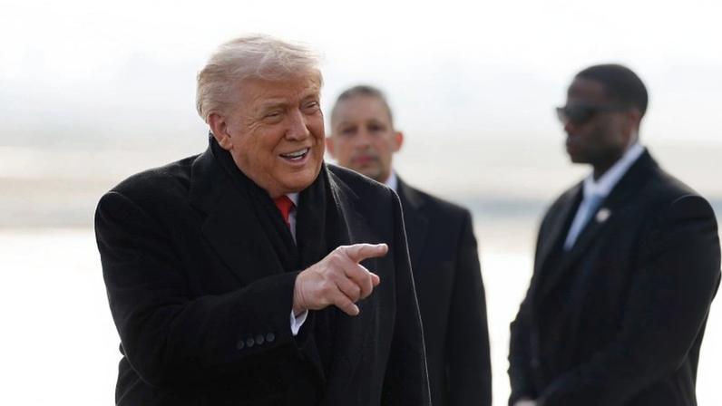U.S. President Donald Trump disembarks Air Force One as he arrives at Zurich Airport in Zurich, Switzerland, before attending the World Economic Forum in Davos.