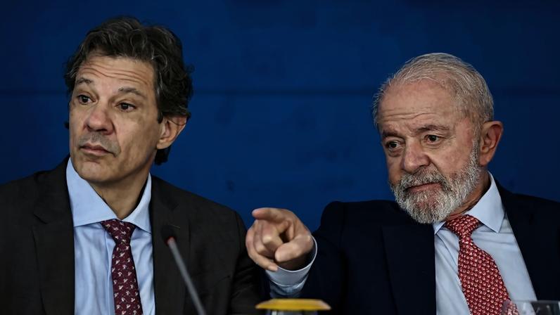 O ministro da Fazenda, Fernando Haddad, e o presidente Lula. Foto: Evaristo Sá/AFP