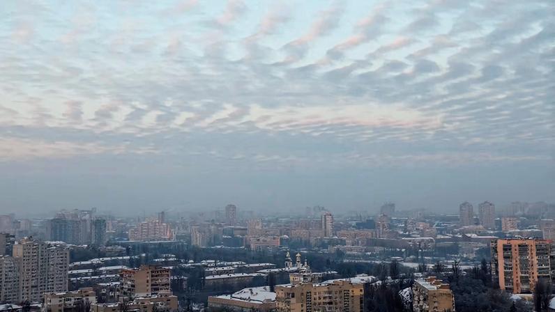 Residential buildings during a power blackout and freezing temperatures after critical civil infrastructure was hit by recent Russian missile and drone attacks, amid Russia's attack on Ukraine, in Kyiv, Ukraine January 13, 2026. REUTERS/Gleb Garanich