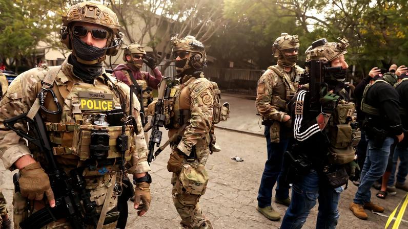 WILLOWBROOK CA JANUARY 21 2026 Border Patrol agents and other law enforcement investigate a shooting involving a...