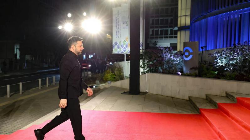 Ukraine's President Volodymyr Zelenskiy arrives at the official opening of Cyprus taking over the EU presidency at the THOC theatre in Nicosia, Cyprus January 7, 2026. HADJIELIA KYRIAKOS /PIO/Handout via REUTERS