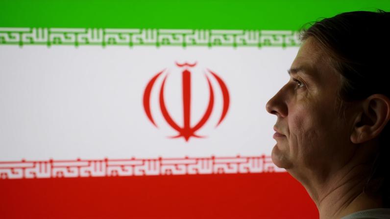 A 3D printed miniature of U.S. President Donald Trump and Iranian flag are seen in this illustration taken January 9, 2026. REUTERS/Dado Ruvic/Illustration
