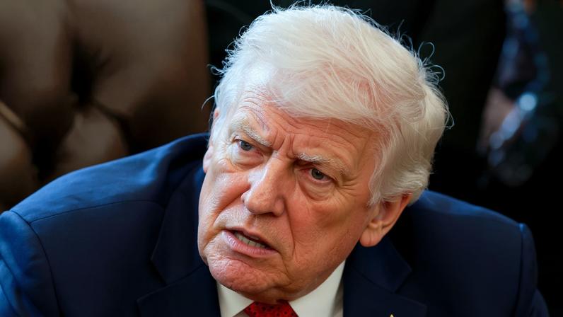 U.S. President Donald Trump speaks in the Oval Office as he signs an executive order recommending loosening the federal regulations on marijuana, at the White House in Washington, D.C., U.S., December 18, 2025. REUTERS/Evelyn Hockstein