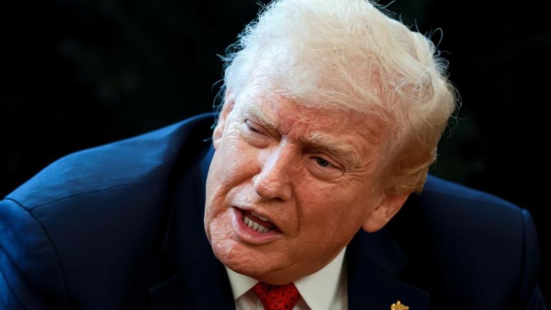U.S. President Donald Trump speaks in the Oval Office as he signs an executive order, at the White House in Washington, D.C., U.S., December 18, 2025. REUTERS/Evelyn Hockstein/File Photo