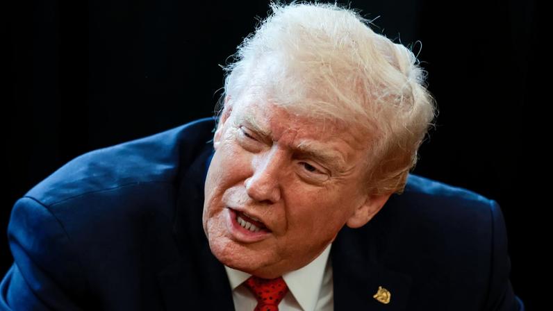 U.S. President Donald Trump speaks in the Oval Office as he signs an executive order, at the White House in Washington, D.C., U.S., December 18, 2025. REUTERS/Evelyn Hockstein/File Photo