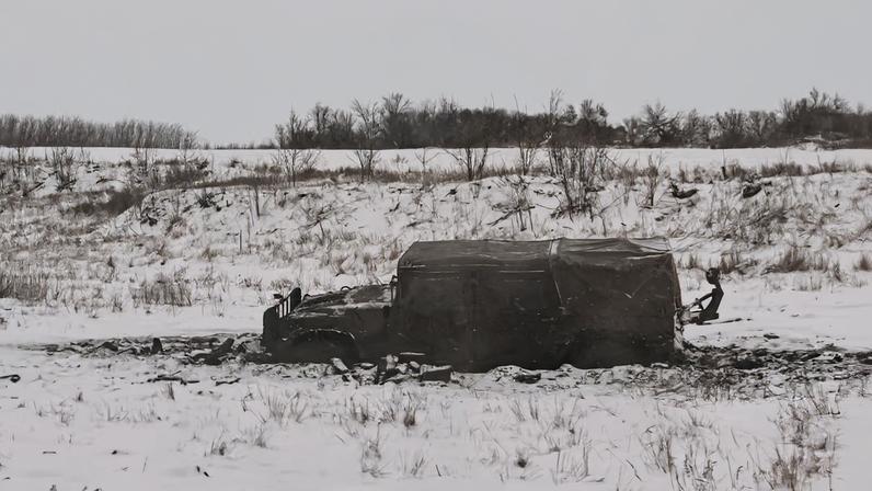 Humvee of Ukrainian servicemen stuck in mud near a front line in Zaporizhzhia region
