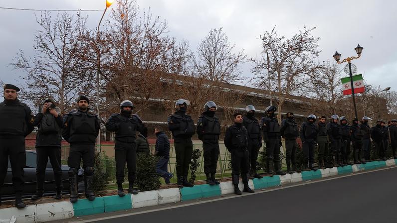 Members of the Iranian police stand guard at a protest in front of the British embassy following anti-government protests in Tehran, Iran, January 14, 2026. Majid Asgaripour/WANA (West Asia News Agency) via REUTERS