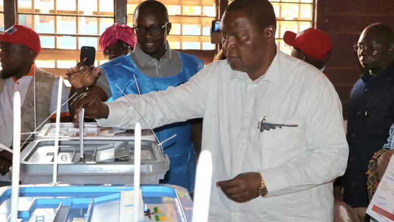 President of the Central African Republic and United Hearts Movement presidential candidate Faustin-Archange Touadera, casts his vote during the presidential election at a polling station in Bangui, Central African Republic December 28, 2025. Central African Presidency's Press Service/Handout via REUTERS