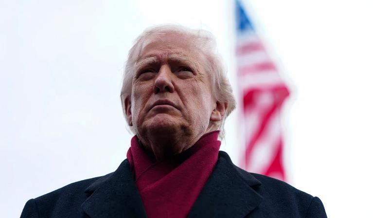 U.S. President Donald Trump looks on as he walks to board Marine One to depart for Joint Base Andrews