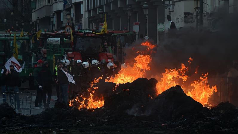 Farmers rally in a large-scale protest in Brussels as leaders meet in EU summit