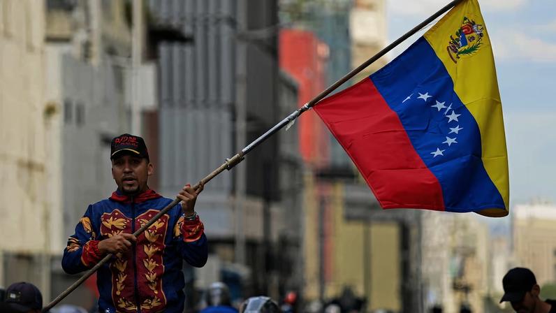 Demonstration outside the National Assembly in Caracas on the day Delcy Rodriguez was formally sworn in as Venezuela's interim president