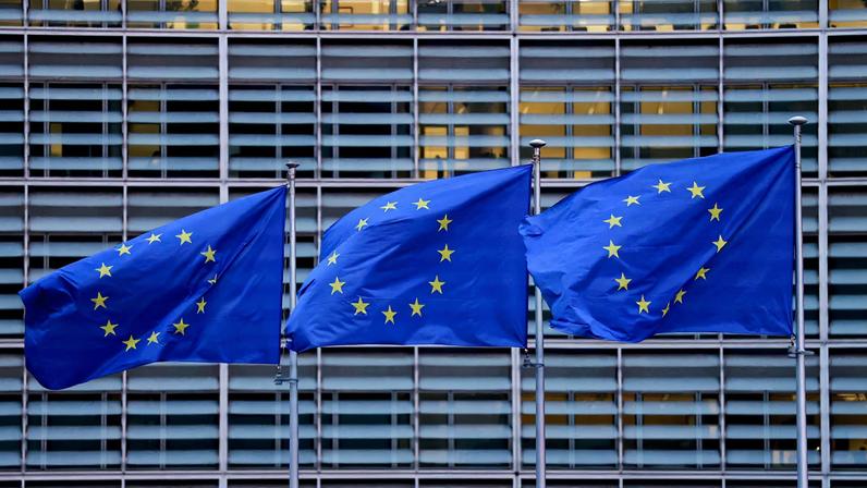European Union flags flutter outside the European Commission headquarters, on the day of a European Union leaders' summit in Brussels, Belgium, December 18, 2025.
