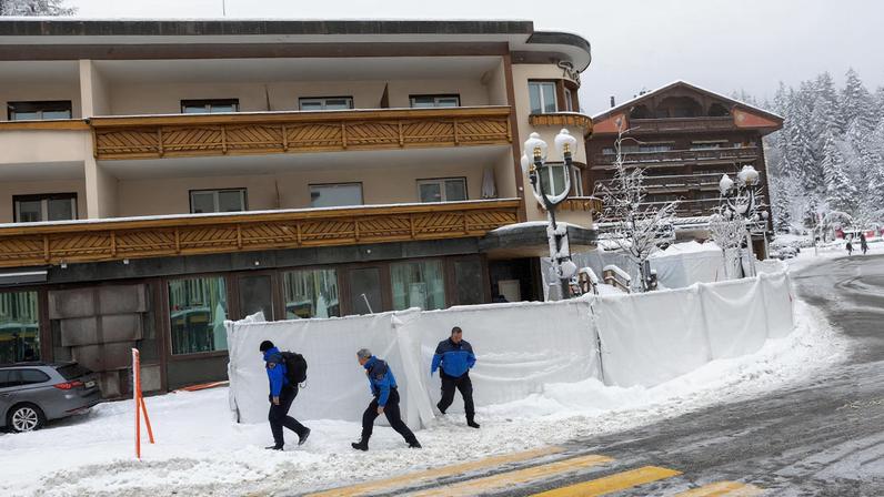 Police officers leave the "Le Constellation" bar, following a deadly fire during a New Year's Eve party, in the upscale ski resort of Crans-Montana in southwestern Switzerland, January 9, 2026. REUTERS/Umit Bektas/File Photo
