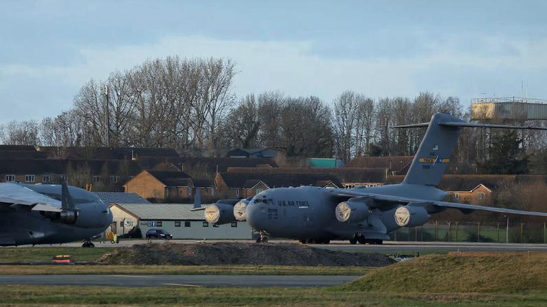 U.S. Air Force C-17 Globemaster III aircraft are parked at RAF Fairford airbase, in Fairford