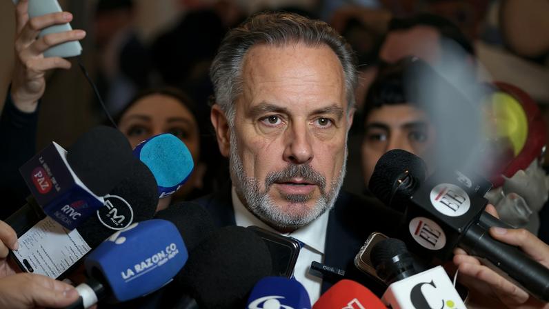 Colombia's Minister of Interior Armando Benedetti speaks to the media on the day of a debate on a labor reform proposed by Colombian President Gustavo Petro's government, at the Congress in Bogota, Colombia, June 11, 2025. REUTERS/Nathalia Angarita