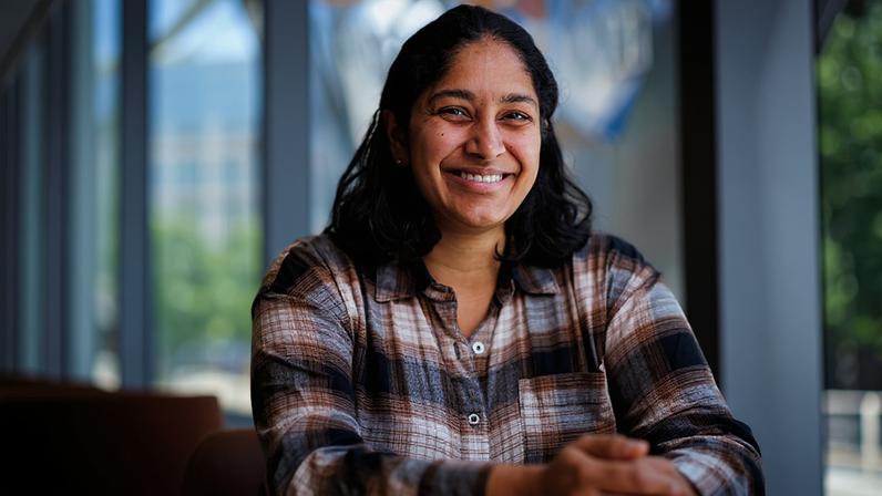 Priya Donti, an MIT electrical engineering and computer science professor, studies how machine learning can make the power grid more efficient and resilient.