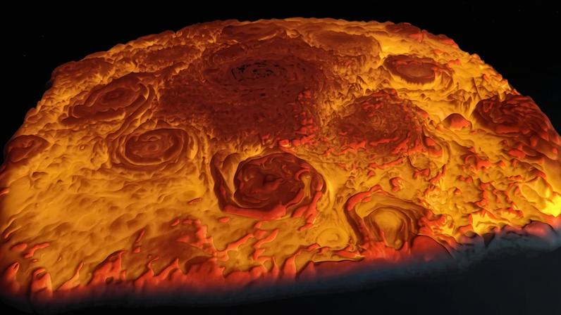 This infrared 3D image of Jupiter's north pole shows a ring of 8 vortices surrounding a central cyclone. MIT researchers have now identified a mechanism that determines whether a gas giant evolves one versus multiple polar vortices.