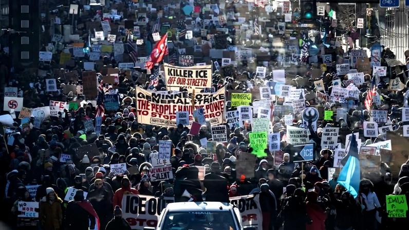 Protesters march through the streets of downtown Minneapolis on Jan. 25, following U.S. Immigration and Customs Enforcement actions in the city.