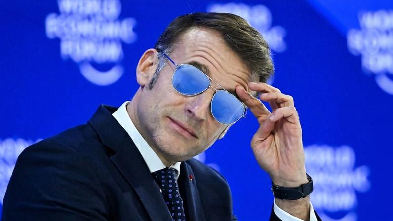 French President Emmanuel Macron gestures during the World Economic Forum annual meeting in Switzerland.