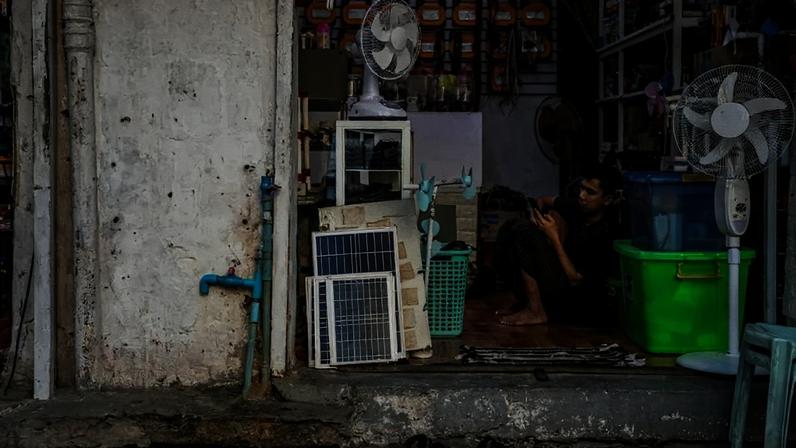 A shop owner sells solar panels in Yangon, Myanmar, on Dec. 29, 2025.