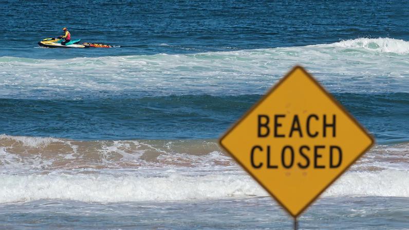 A lifeguard patrols North Steyne beach as beaches are closed after recent shark attacks, in Sydney, Australia, January 20, 2026. REUTERS/Jeremy Piper/File Photo