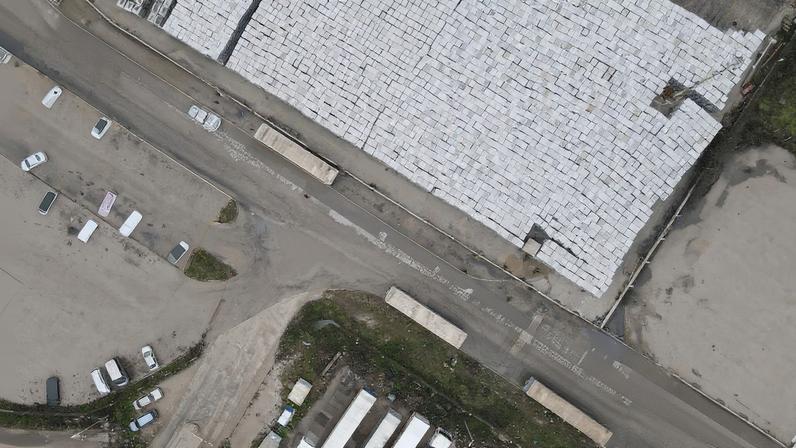 A drone view of truck drivers and transport union representatives protesting in front of the Port of Bar, as part of wider Western Balkans blockades against the EU's new entry–exit rules, with growing concerns over fuel shortages after Montenegro's energy ministry warned supplies were limited to what was available at petrol stations, in Bar, Montenegro, January 29, 2026. REUTERS/Stevo Vasiljevic