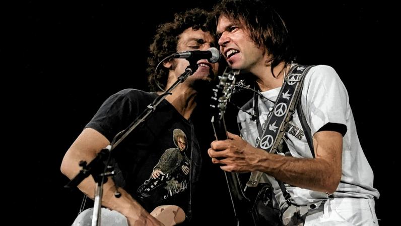 Neil Young with Crazy Horse onstage in 1978. The first-ever recorded show by Young and the band took place in 1970.