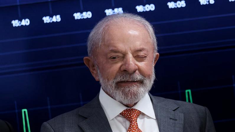 Brazil's President Luiz Inacio Lula da Silva reacts before a ceremony to launch a digital platform for tax reform in Brasilia