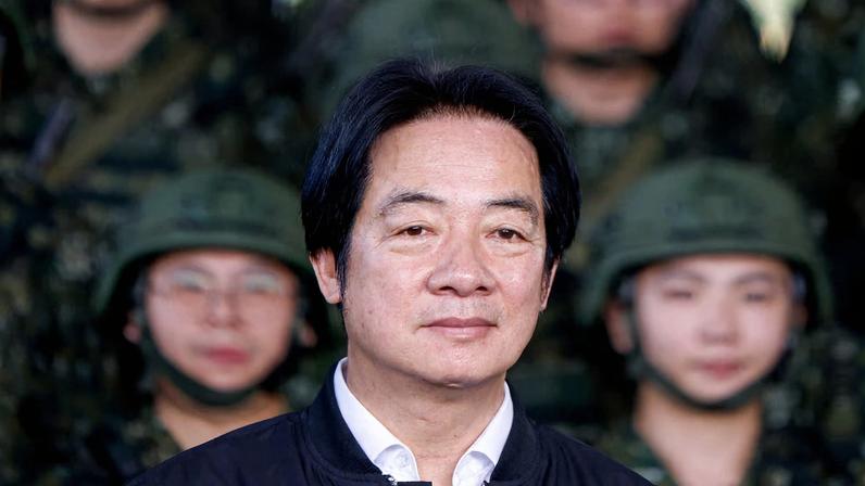 Taiwan President Lai Ching-te inspects reservists during a training session at Loung Te Industrial Parks Service Center in Yilan