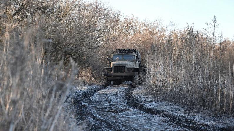 Ukrainian servicemen drive an MLRS in a front line in Donetsk region
