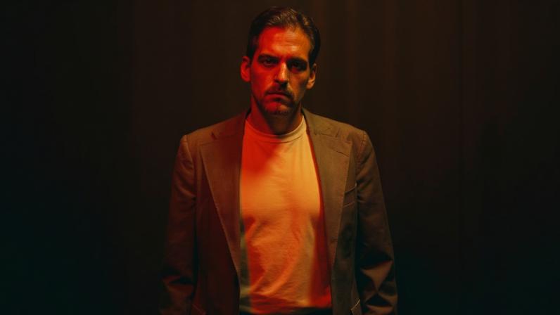 Spencer Thomas goes full Eighties vibes on the new song "The World Is Fucked and I Love You."