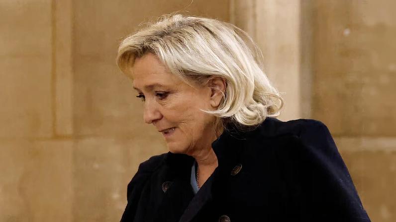 French far-right leader Marine Le Pen, member of parliament from the Rassemblement National (National Rally - RN) party, arrives for a hearing in her appeal trial alongside the RN party itself and 10 others defendants found guilty of diverting European Parliament funds, at the Paris courthouse on the Ile de la Cite, in Paris, France, January 20, 2026. REUTERS/Benoit Tessier