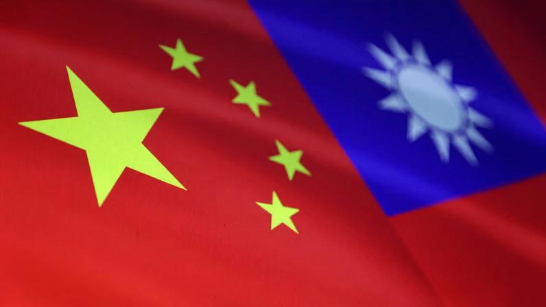 Chinese and Taiwanese flags are seen in this illustration, August 6, 2022. REUTERS/Dado Ruvic/Illustration
