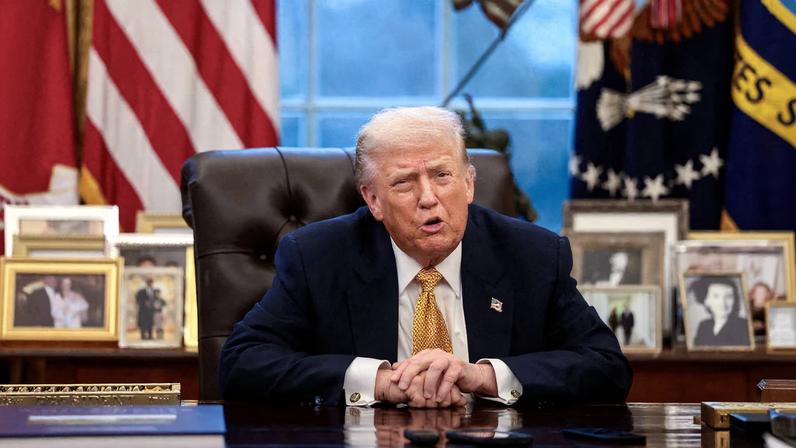 U.S. President Donald Trump is interviewed by Reuters White House correspondent Steve Holland (not pictured) during an exclusive interview in the Oval Office in the White House in Washington, D.C., U.S., January 14, 2026. REUTERS/Evelyn Hockstein/File Photo