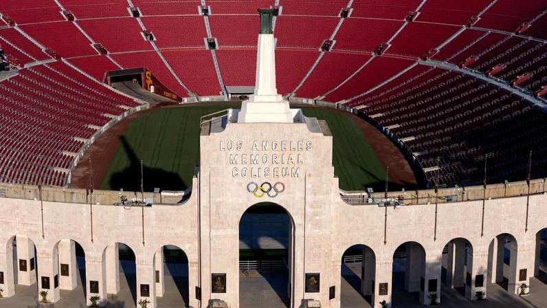 A drone view of Los Angeles Coliseum, as it was announced it will host the opening ceremonies of the 2028 Olympics along with SoFi Stadium in a dual event, closing ceremony, and host the opening of the Paralympic Games in 2028, making it the first facility to host events for 3 Olympic Games in Los Angeles, California, U.S., May 8, 2025.