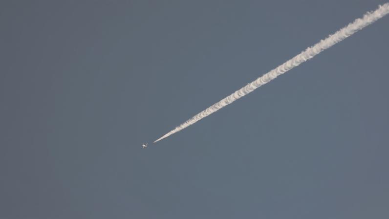 A Turkish fighter jet flies over the town of Hassa on the Turkish-Syrian border in Hatay province