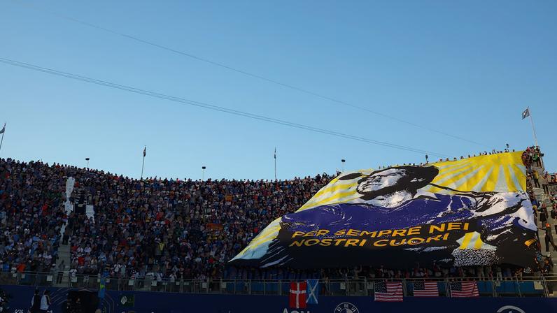 Spectators in the stands hold up a banner as tribute to the late Seve Ballesteros on the 1st hole ahead of the Foursomes