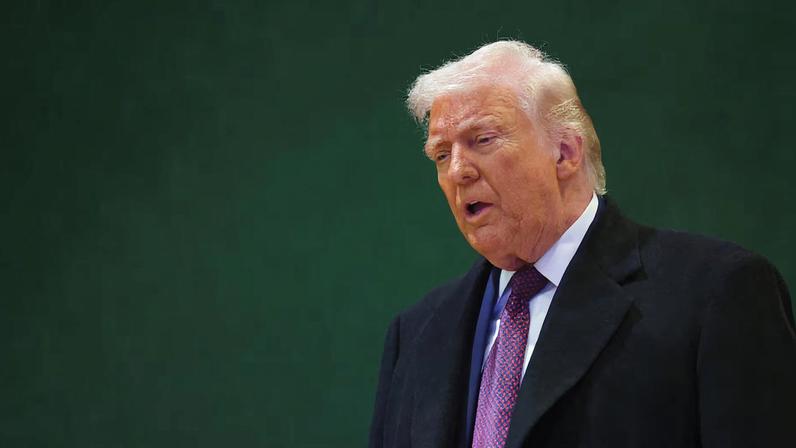 U.S. President Donald Trump speaks to the media during the 56th annual World Economic Forum (WEF) meeting in Davos, Switzerland, January 22, 2026. REUTERS/Denis Balibouse/File Photo