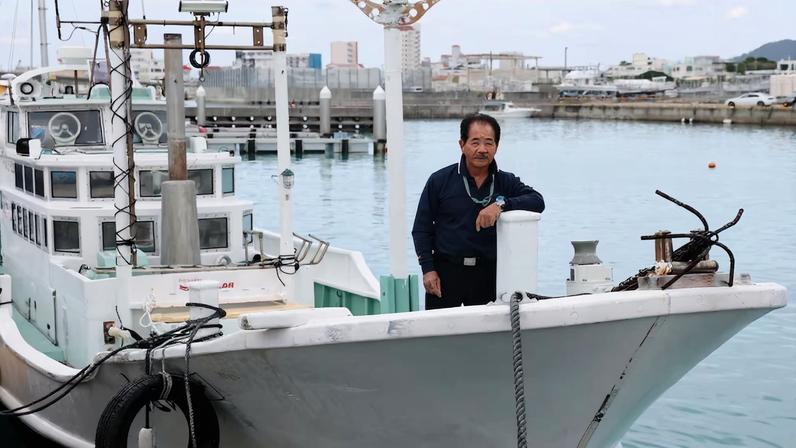 Hitoshi Nakama, a fisherman and local councilor in Ishigaki who has been fishing around a group of disputed islands called Senkaku Islands in Japan, also known in China as Diaoyu Islands, speaks during an interview with Reuters in Ishigaki