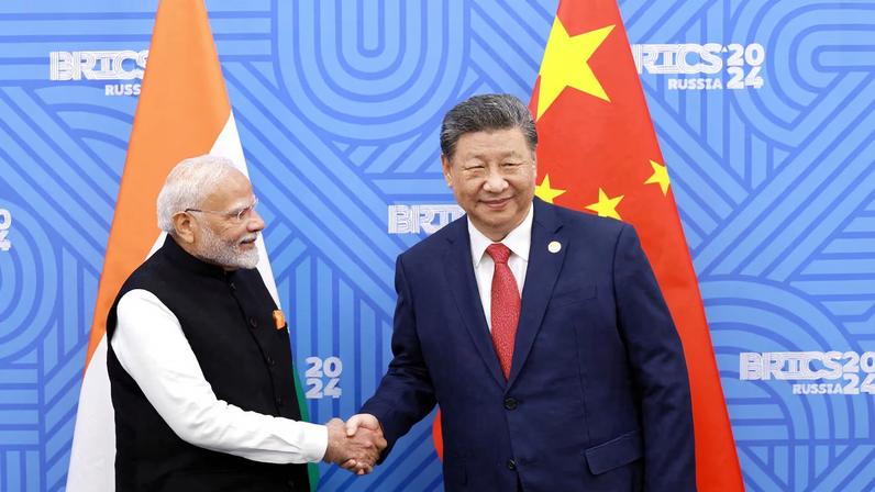 Chinese President Xi Jinping and India Prime Minister Narendra Modi meet on the sidelines of the BRICS summit in Kazan, Russia October 23, 2024. China Daily via REUTERS /File Photo